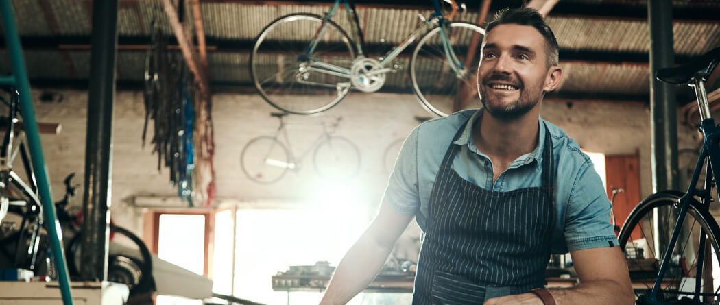 man in a bicycle shop