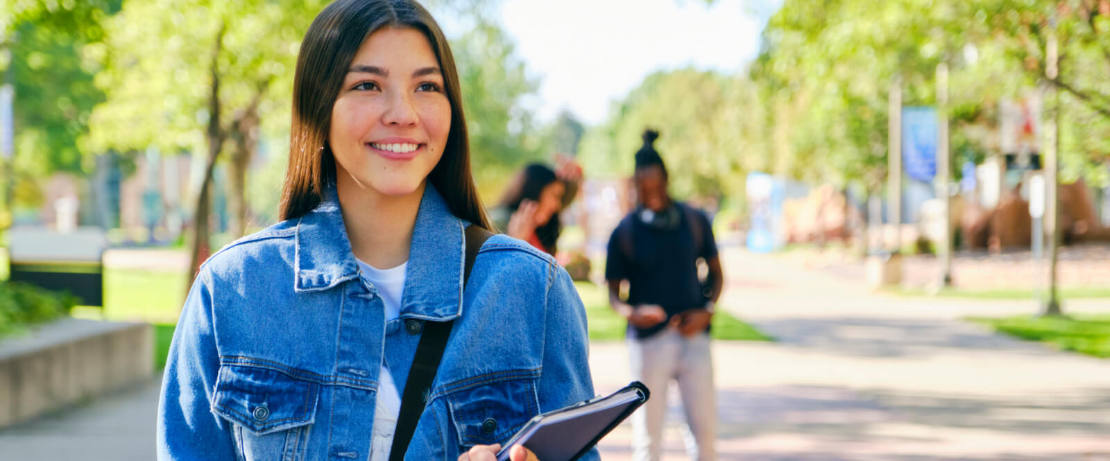 Young woman walking on a school campus